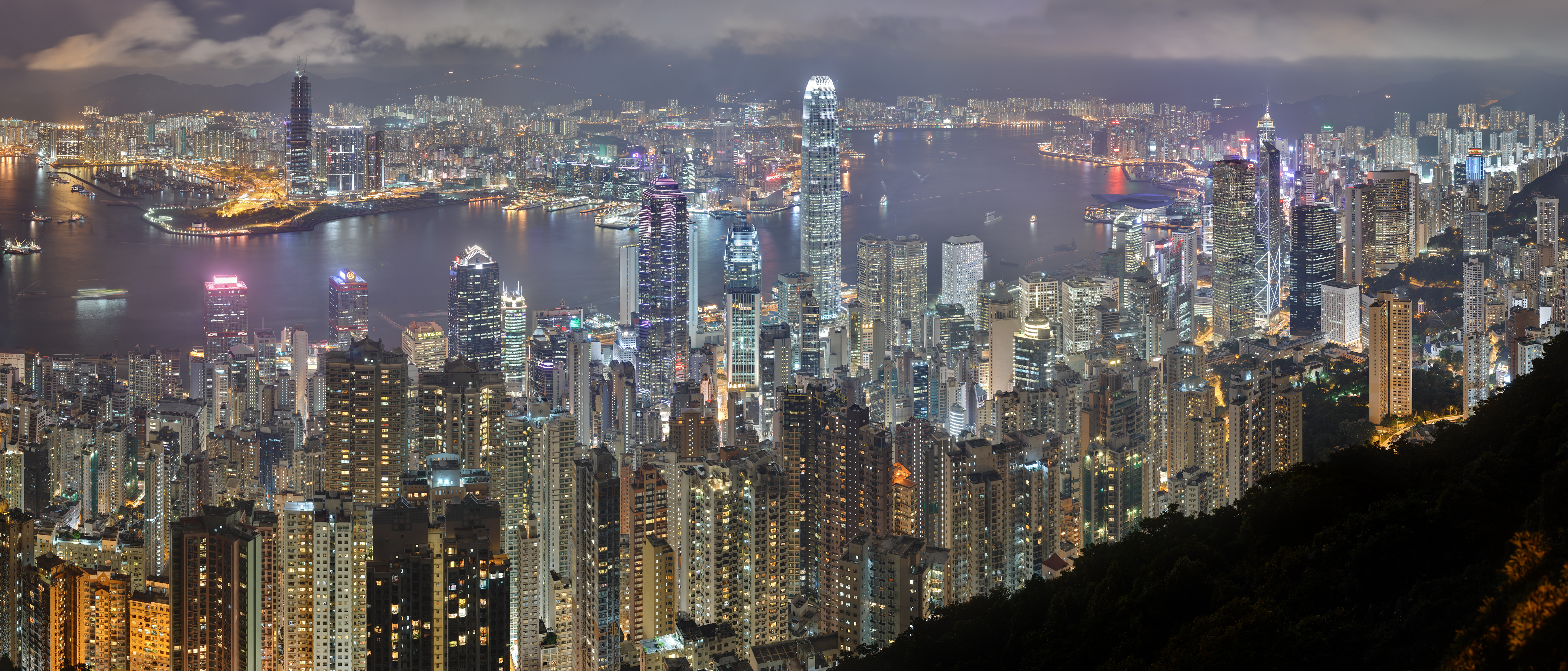 Panoramic view of the Hong Kong night skyline, 2008. Photo credit: Base64, retouched by Carol Spears. Licensed under the Creative Commons Attribution-Share Alike 3.0 Unported license.